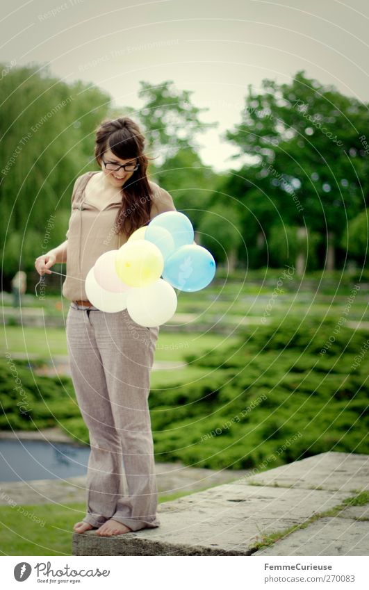 Blown up. Summer Feminine Young woman Youth (Young adults) Woman Adults 1 Human being 18 - 30 years Leisure and hobbies Joy Birthday Preparation Balloon Looking
