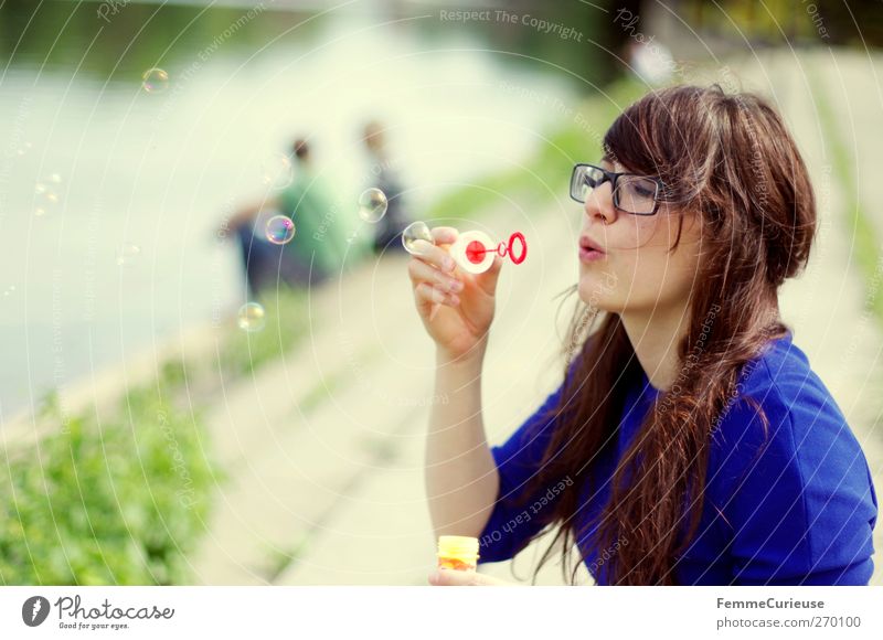Blowing bubbles ... Feminine Young woman Youth (Young adults) Woman Adults 1 Human being 18 - 30 years Leisure and hobbies Joy Soap bubble Bubble Couple