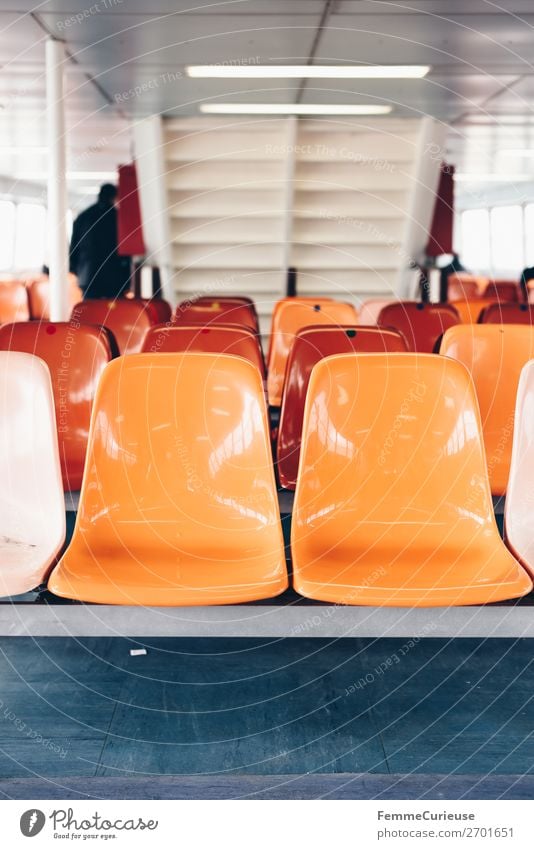 Interior of a ferry with colourful seats Transport Means of transport Passenger traffic Public transit Navigation Steamer Ferry Vacation & Travel Seating Orange