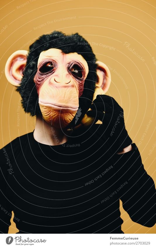 Person with monkey mask using banana as telephone 1 Human being Joy Communicate Telephone Cellphone Banana Telecommunications Monkeys Chimpanzee Mask Disguised