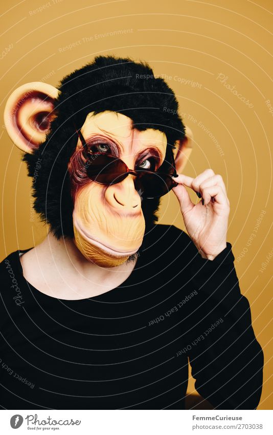 Person with monkey mask looking cool over sunglasses 1 Human being Animal Joy Cool (slang) Easygoing Anonymous Disguised Sunglasses Mask Monkeys Chimpanzee