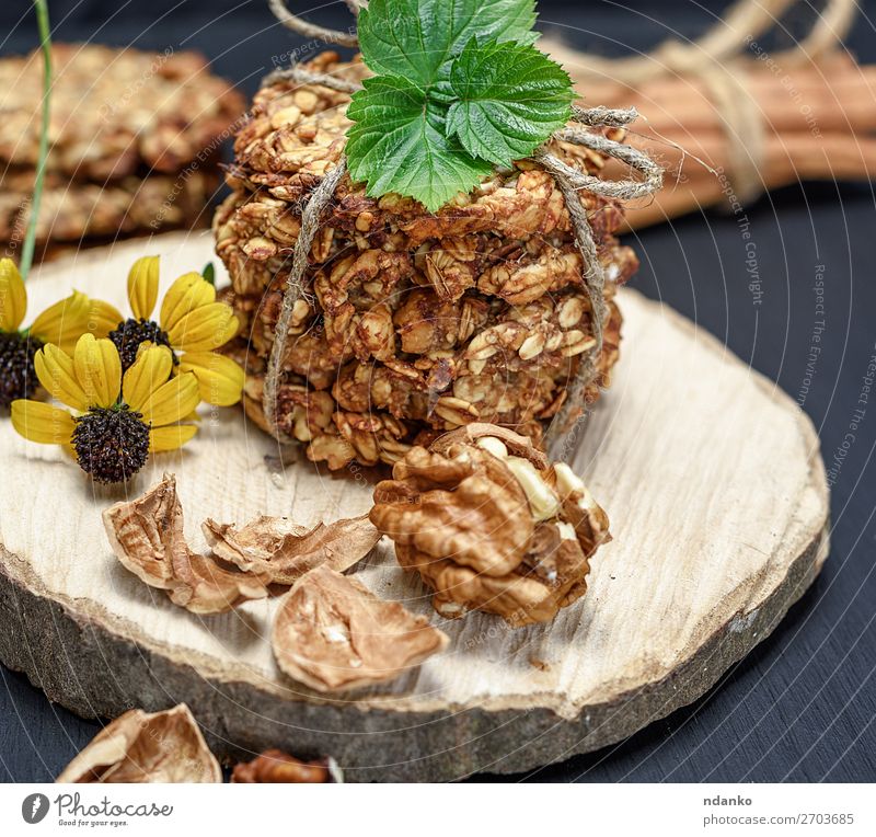 cookies made from oat flakes Cake Dessert Candy Nutrition Breakfast Lunch Diet Table Kitchen Flower Leaf Wood Delicious Natural Brown Yellow Black White Energy