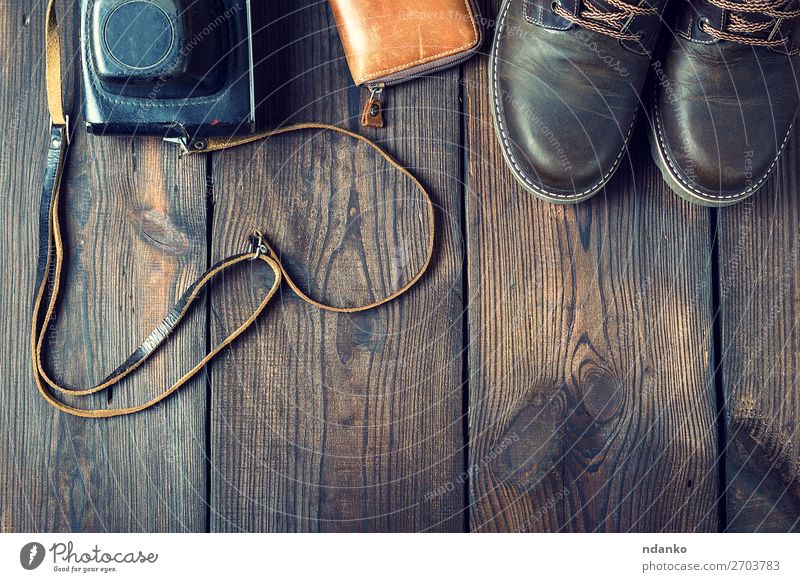 pair of leather brown shoes and an old vintage camera Style Design Camera Fashion Clothing Leather Accessory Footwear Wood Old Retro Brown Black Idea background
