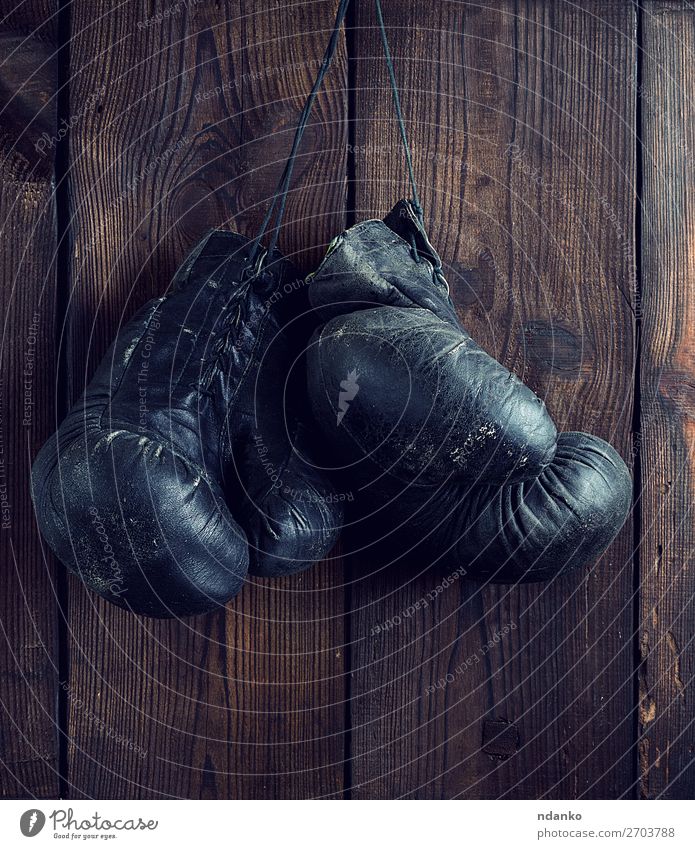 old shabby black leather boxing gloves Lifestyle Athletic Sports Rope Leather Gloves Wood Old Fitness Hang Dirty Retro Brown Black Protection Competition