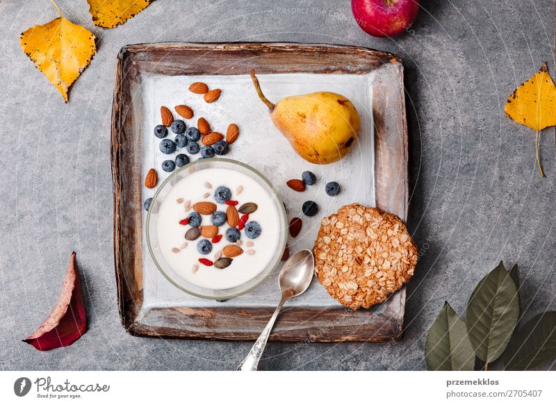 Breakfast on table. Yogurt with added blueberries and almonds Food Yoghurt Dairy Products Fruit Apple Grain Bread Dessert Nutrition Eating Lunch Organic produce