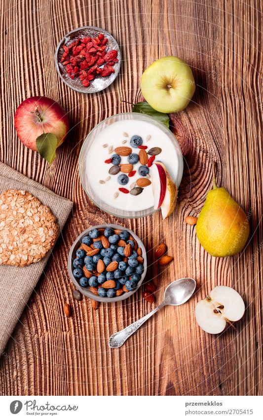 Breakfast on table. Yogurt with added blueberries and almonds Food Yoghurt Dairy Products Fruit Apple Bread Dessert Nutrition Eating Lunch Vegetarian diet Diet