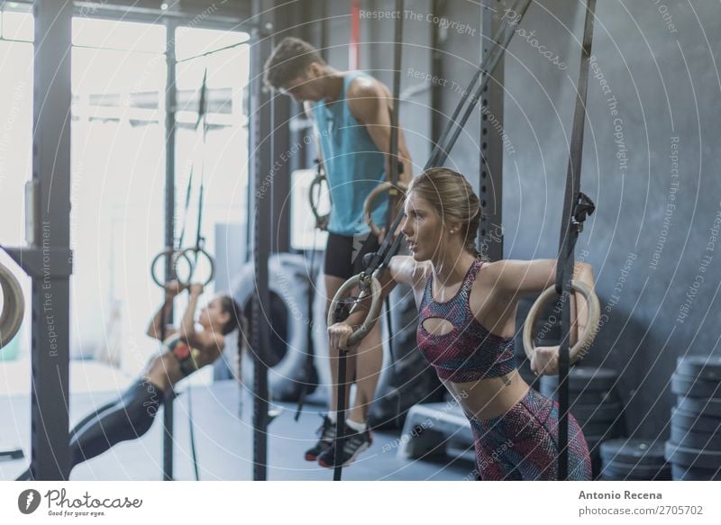 People training in gym olimpic rings and chin bar Sports Fitness Sports Training Track and Field Sportsperson Sports team Human being Woman Adults Man Ring
