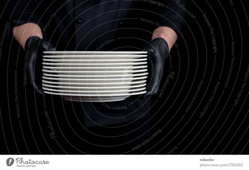 a stack of round white empty plates Plate Kitchen Restaurant Profession Human being Man Adults Hand Gloves Stand Dark Black White Stack Caucasian chef cook