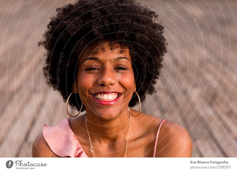 closeup portrait of a young beautiful afro american woman Lifestyle Style Happy Beautiful Hair and hairstyles Summer Sun Woman Adults Landscape Park Fashion