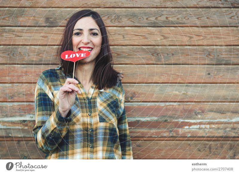 Love,young woman holding a lollipop in his mouth Lifestyle Style Joy Beautiful Face Feasts & Celebrations Valentine's Day Human being Feminine Young woman