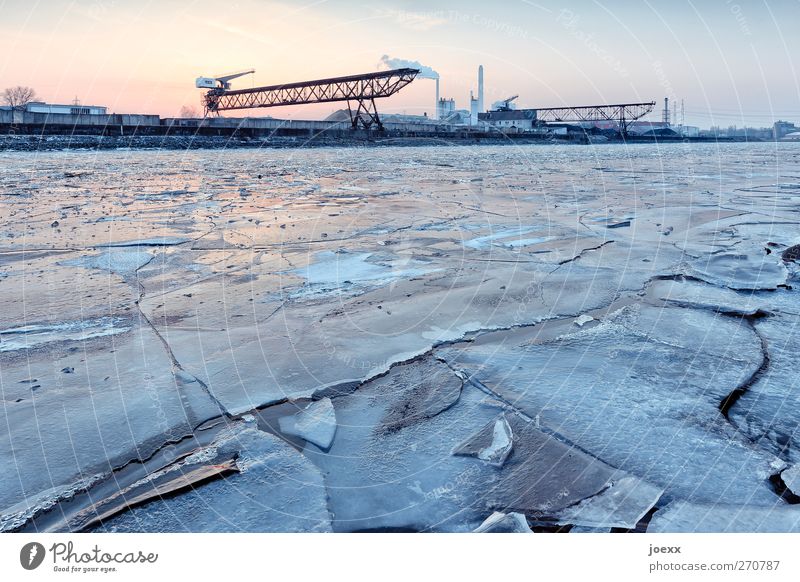 Winter view of harbour basin with closed ice cover Sky Beautiful weather Ice Frost River Harbour Cold Blue Orange Black rhine harbour Colour photo Exterior shot