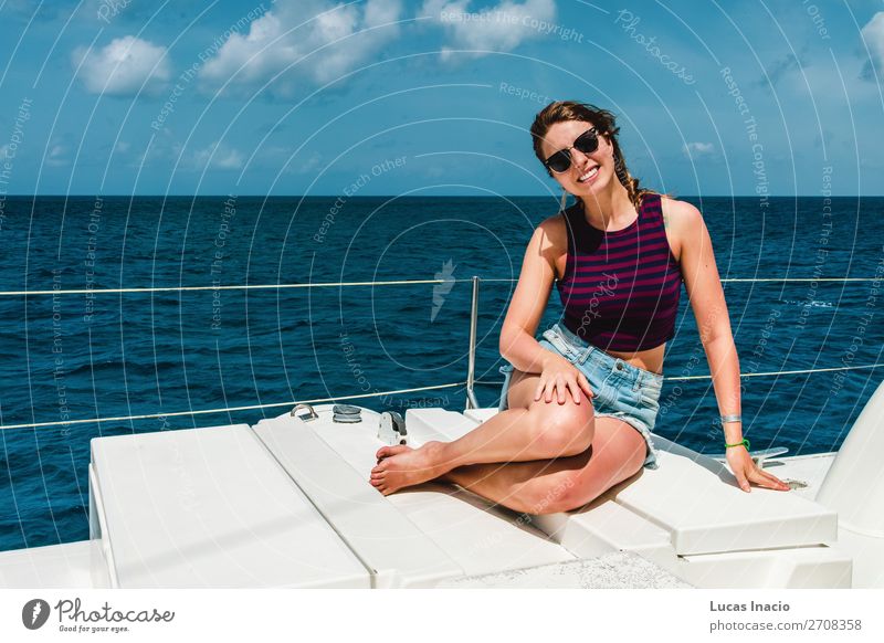 Girl in a boat near Saona Island, Dominican Republic Happy Vacation & Travel Tourism Summer Beach Ocean Woman Adults Environment Nature Sand Coast Watercraft