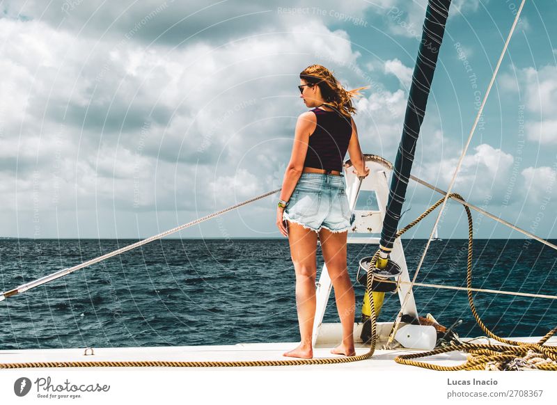 Girl in a boat near Saona Island, Dominican Republic Happy Vacation & Travel Tourism Summer Beach Ocean Woman Adults Environment Nature Sand Coast Watercraft