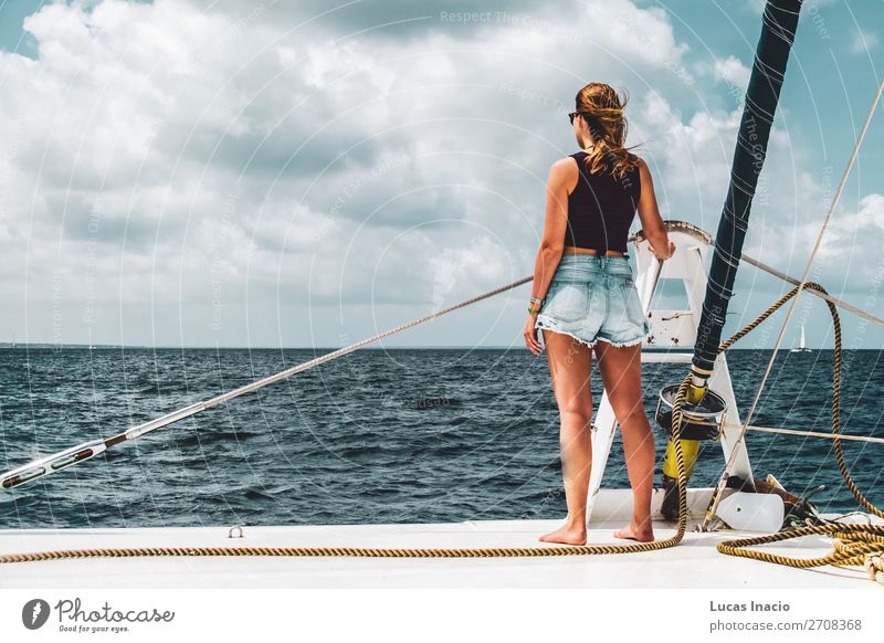 Girl in a boat near Saona Island, Dominican Republic Happy Vacation & Travel Tourism Summer Beach Ocean Woman Adults Environment Nature Sand Coast Watercraft