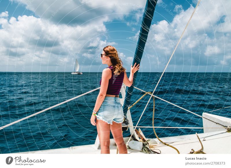 Girl in a boat near Saona Island, Dominican Republic Happy Vacation & Travel Tourism Summer Beach Ocean Woman Adults Environment Nature Sand Coast Watercraft