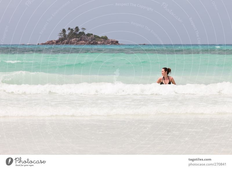 ST. PIERRE Woman Ocean Seychelles Saint-Pierre Praslin Nature Vacation & Travel Relaxation Swimming & Bathing Float in the water Waves Surf Island