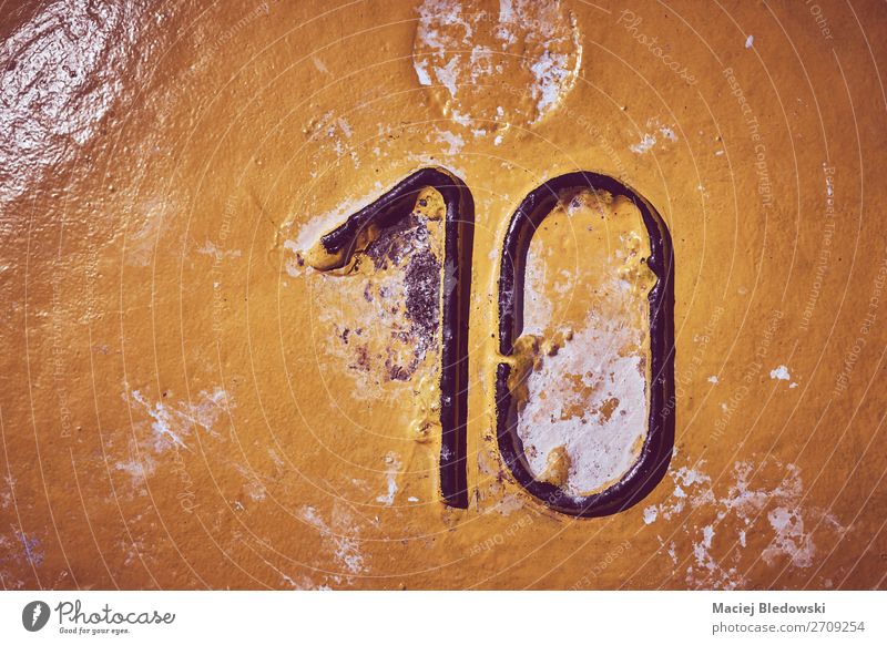 Number ten on yellow painted steel background. Wallpaper Steel Sign Digits and numbers Old Dirty Authentic Creepy Gloomy Yellow 10 Grunge vintage stain filtered