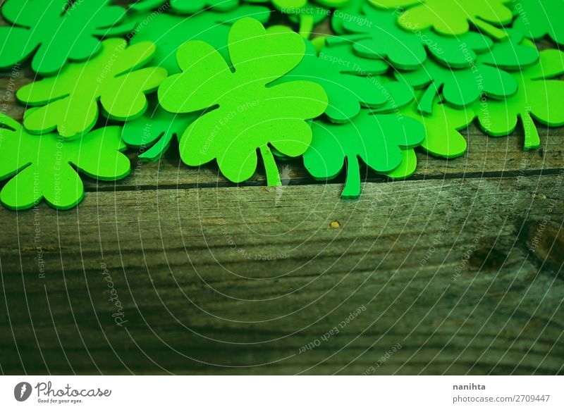 Beautiful close-up of a pile of green shamrocks Design Happy Table Wallpaper Feasts & Celebrations Culture Leaf Paper Wood Ornament Hip & trendy Green Colour
