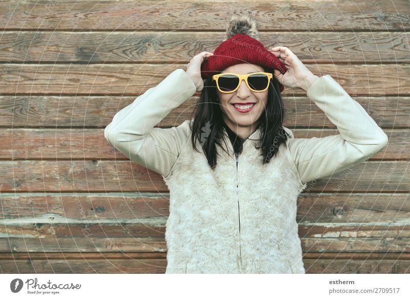 Young woman with cap and Sunglasses in winter Lifestyle Joy Vacation & Travel Trip Winter Snow Human being Feminine Youth (Young adults) Woman Adults 1