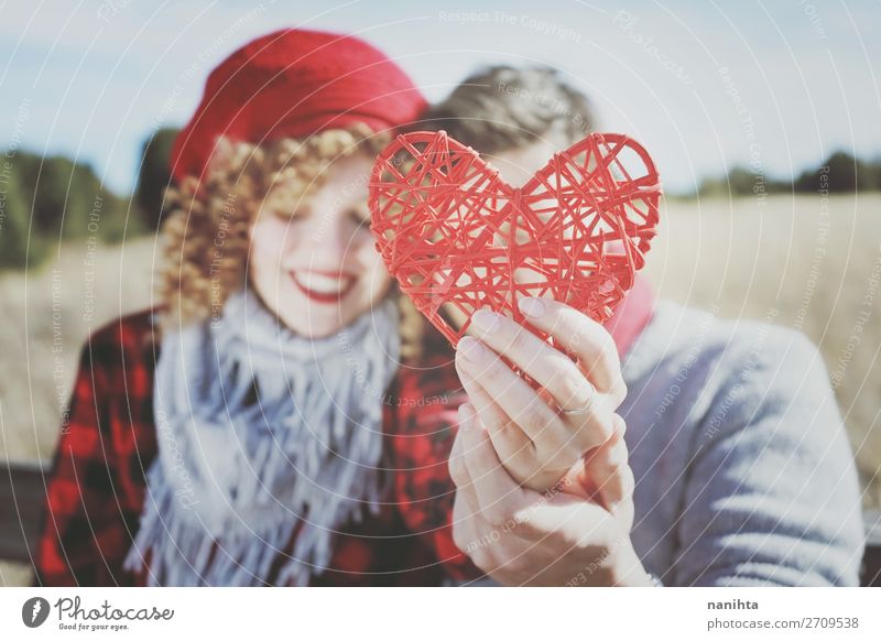 close-up of a beautiful red heart held by a romantic couple Lifestyle Joy Happy Beautiful Sunbathing Valentine's Day Human being Masculine Feminine Woman Adults
