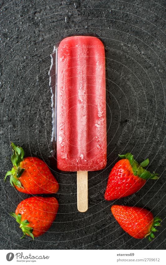Strawberry popsicle on black slate background Food Healthy Eating Food photograph Fruit Dessert Ice cream Candy Fresh Cold Sweet Red Black Summer