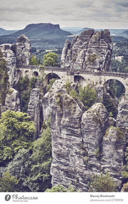 Retro toned picture of the Bastei Bridge, Germany. Vacation & Travel Tourism Trip Adventure Sightseeing Mountain Hiking Nature Landscape Tree Park Forest Rock