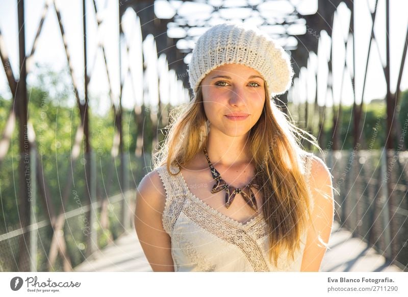 portrait of a young woman at sunset Lifestyle Joy Happy Beautiful Skin Face Relaxation Summer Sun Human being Woman Adults Hand Nature Landscape Warmth Bridge