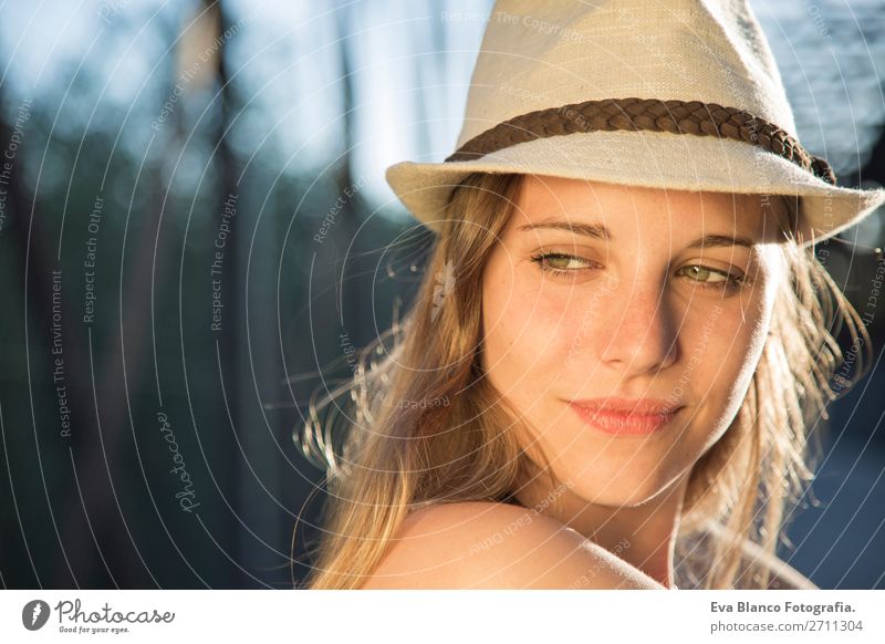 portrait of a young woman at sunset Lifestyle Joy Happy Beautiful Skin Face Relaxation Summer Sun Human being Woman Adults Hand Nature Landscape Warmth Bridge