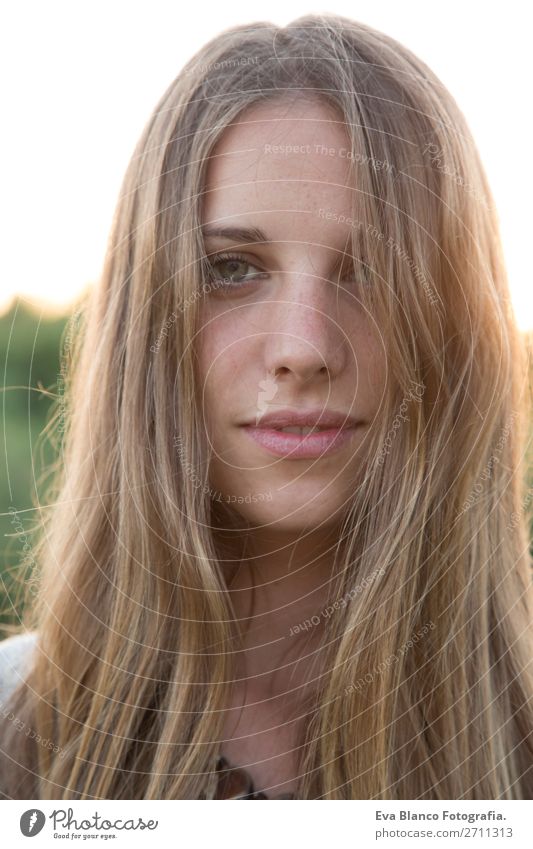 close up portrait of a beautiful young woman at sunset Lifestyle Joy Happy Beautiful Skin Face Relaxation Summer Sun Human being Woman Adults Hand Nature