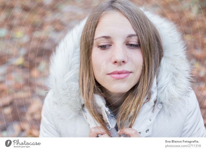 Winter outdoor fashion portrait of stylish young woman posing at