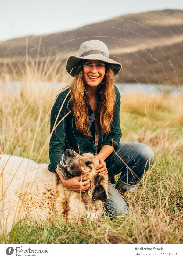 Smiling woman with dog Woman Dog stroking Nature Happy Animal Pet Friendship Adults big Beautiful Youth (Young adults) Love Leisure and hobbies Lifestyle
