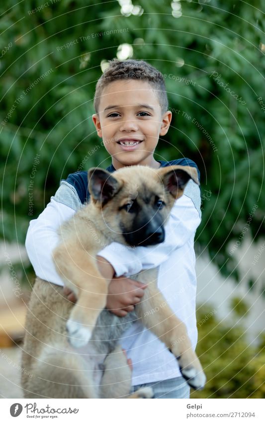 Latin child with his dog Lifestyle Joy Happy Face Relaxation Leisure and hobbies Child Human being Boy (child) Man Adults Family & Relations Friendship Infancy