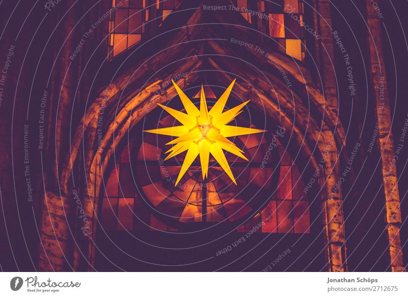 Herrnhuter Stern hangs from a church in Advent Christmas & Advent Facade Hang Retro Yellow Violet Hope Tradition Advent star Herrnhuter Star Church window