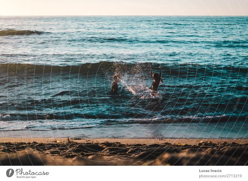 Couple Playing on the Beach at Sunset Cliffs, San Diego Vacation & Travel Tourism Summer Summer vacation Ocean Waves Human being Masculine Feminine Young woman