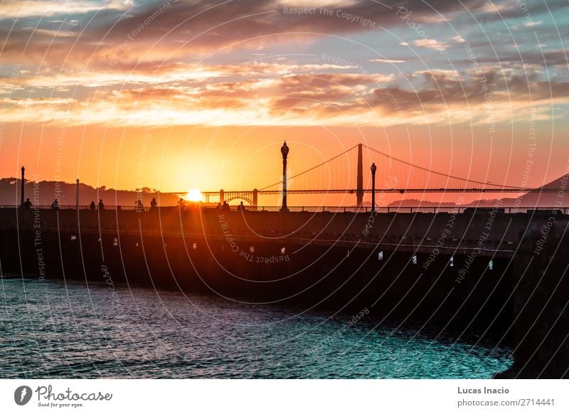 Sunset at Golden Gate Bridge in San Francisco, California Vacation & Travel Tourism Summer Beach Ocean Environment Nature Sand Sky Clouds Coast Skyline Building