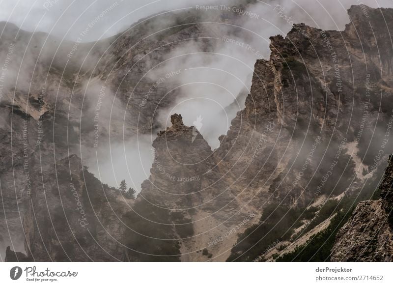 Above Braies Lake with clouds in the Dolomites III Tourism Structures and shapes Copy Space bottom Vacation & Travel Light Copy Space right Shadow Contrast