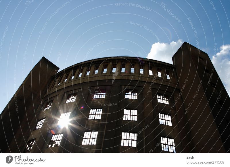 wink Energy industry Sky Sun Sunlight Beautiful weather Deserted Manmade structures Building Architecture Gasometer Facade Window Tower Old Blue Transience