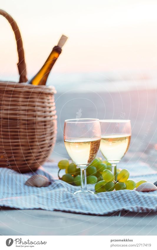 Two wine glasses, grapes, wicker basket on beach Fruit Beverage Alcoholic drinks Wine Champagne Bottle Champagne glass Lifestyle Beautiful Relaxation