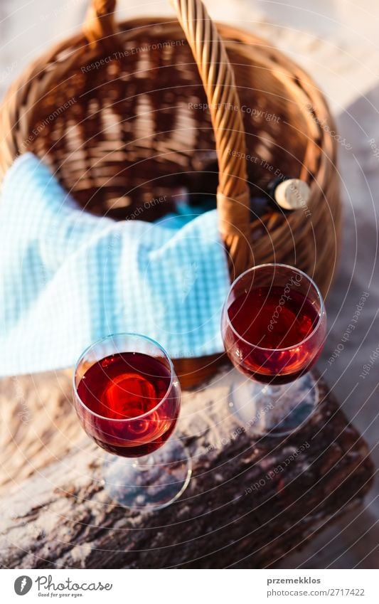 Two wine glasses, grapes, wicker basket on beach Beverage Alcoholic drinks Wine Champagne Bottle Champagne glass Beautiful Relaxation Vacation & Travel Summer