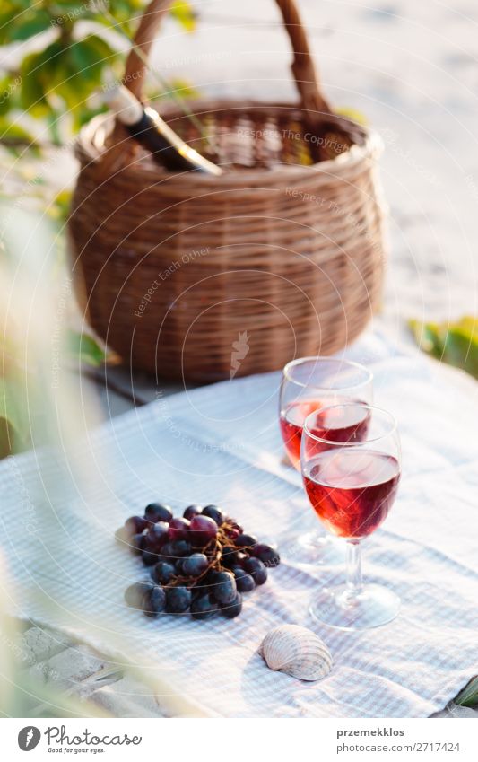Two wine glasses, grapes, wicker basket on beach Fruit Beverage Alcoholic drinks Wine Champagne Bottle Champagne glass Beautiful Relaxation Vacation & Travel