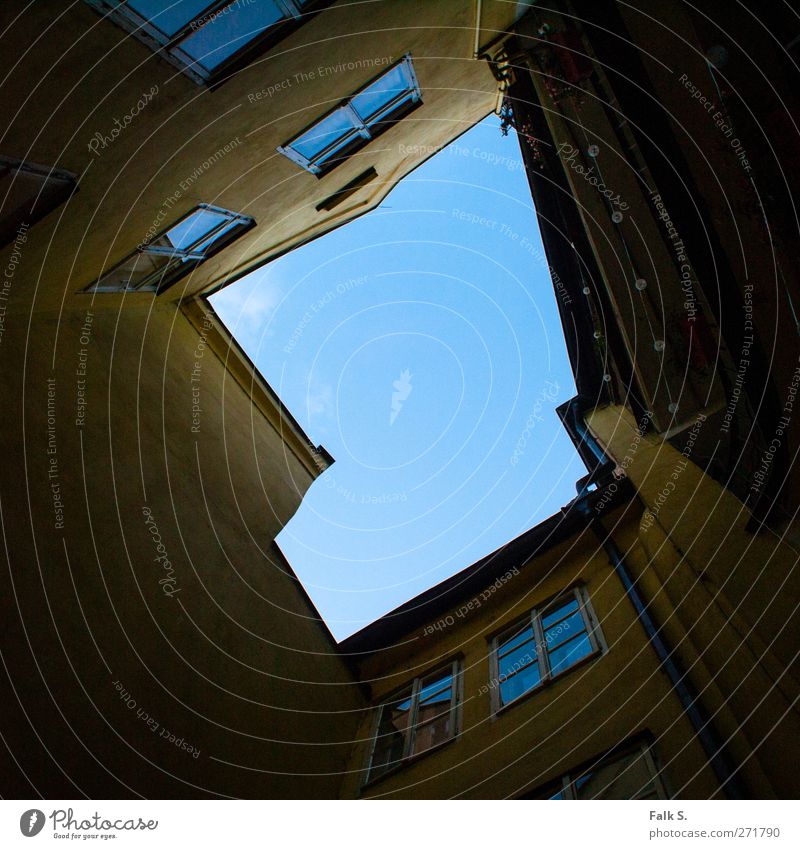 upward House (Residential Structure) Air Sky Cloudless sky Beautiful weather Town Wall (barrier) Wall (building) Facade Balcony Window Eaves Interior courtyard