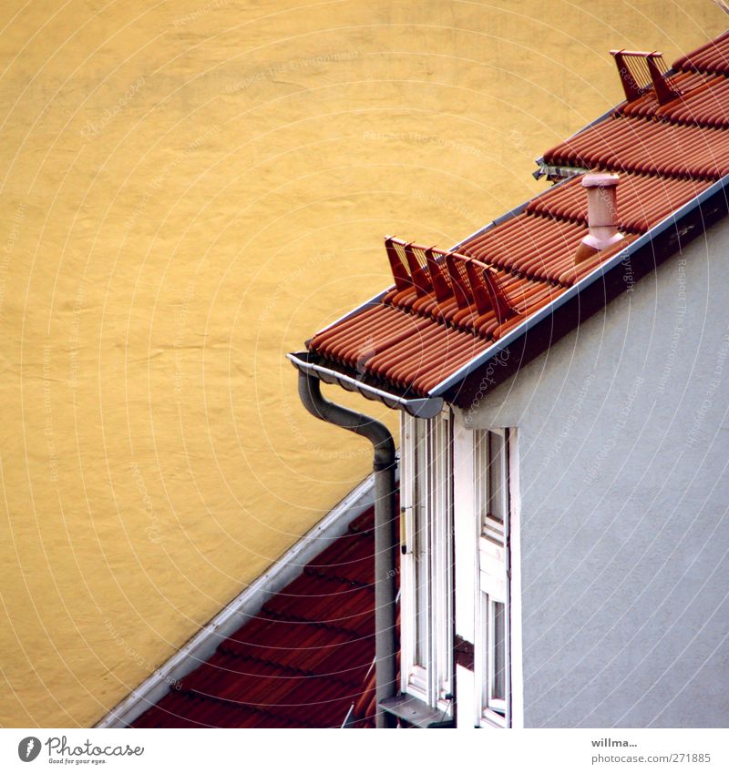 sloping roof House (Residential Structure) Detached house Building Wall (building) Roof Eaves Tiled roof Roofing tile Yellow Red Diagonal Tilt Copy Space left