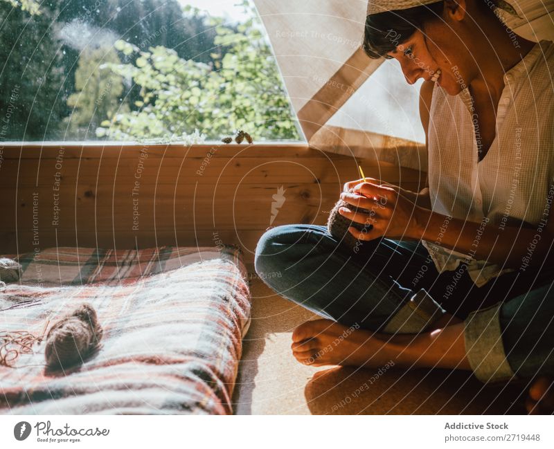 Woman knitting in sunlight Knit House (Residential Structure) Nature Home Relaxation Contentment woolen Comfortable Sunlight Safety (feeling of) Wood Summer