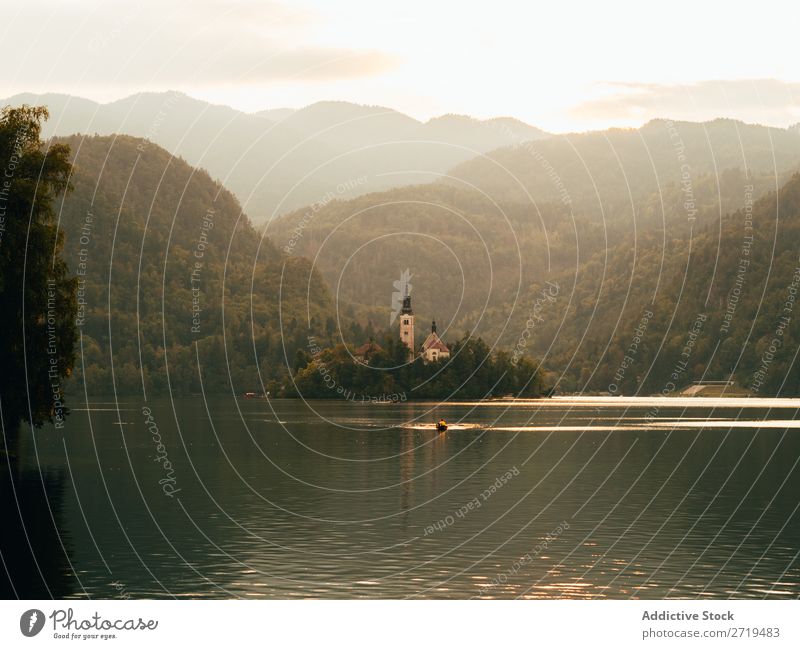 Small island with building among lake. Bled Lake, Slovenia. Island House (Residential Structure) Landscape Cottage Vacation & Travel Water Rural Exterior shot