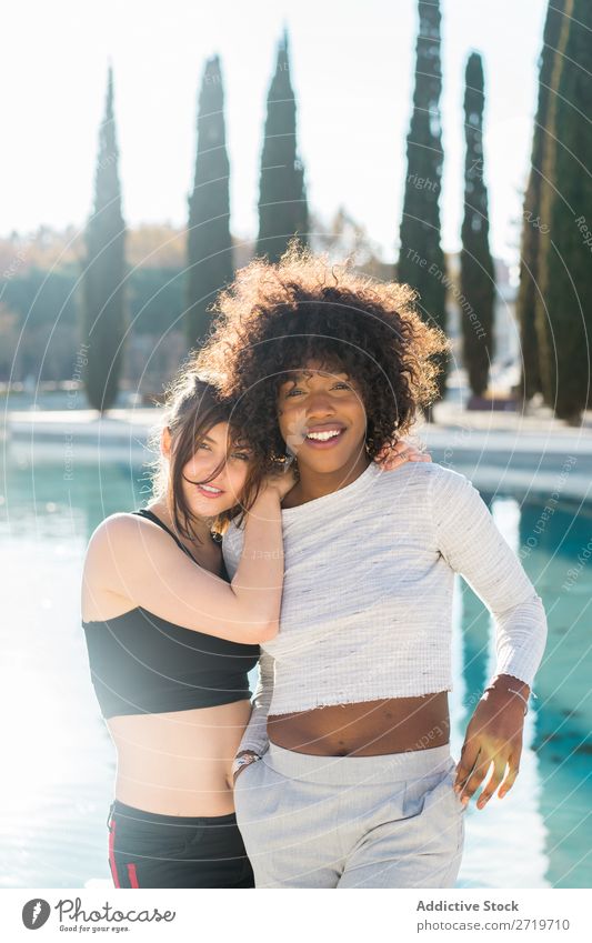 Cheerful women standing on street together Woman pretty Beautiful Youth (Young adults) Pond Park Cool (slang) City Town Style Portrait photograph Human being