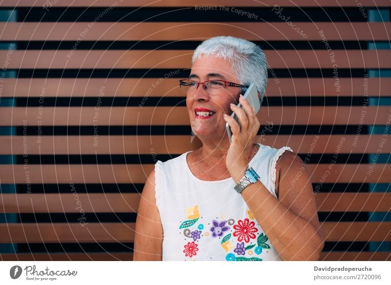 Happy elderly woman on the mobile phone Woman grey hair Old Cellphone PDA Technology Portrait photograph Beauty Photography Communication Cheerful retired