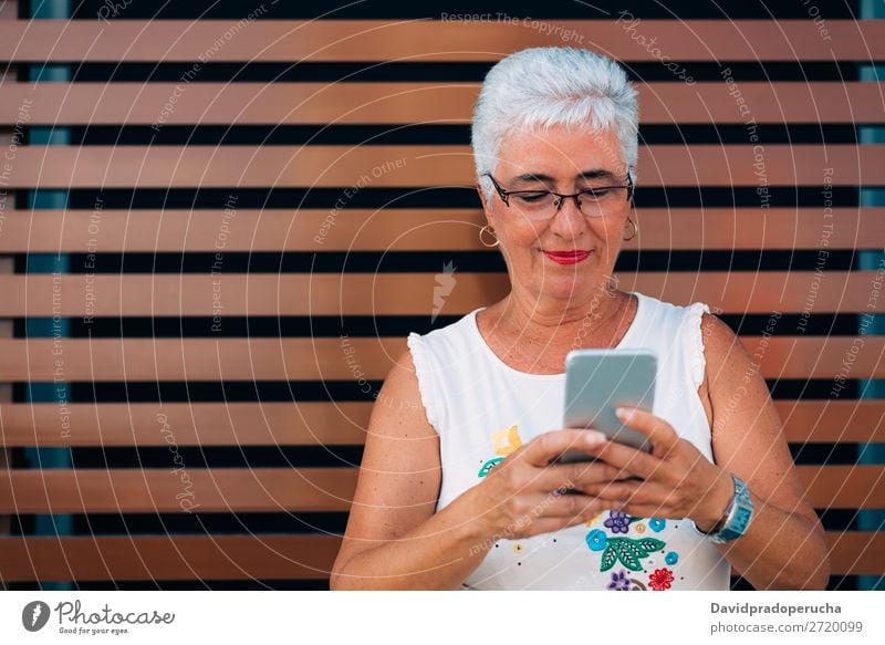 Happy elderly woman on the mobile phone Woman grey hair Old Cellphone PDA Technology Portrait photograph Beauty Photography Communication Cheerful retired