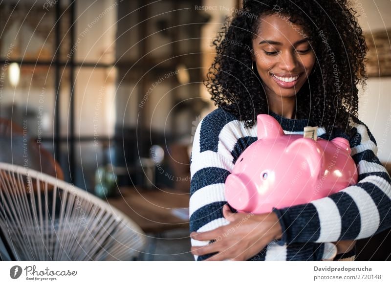Black woman hugging her piggy bank Woman Money box savings Success Business cash Coin US Dollar Beautiful Happy Cheerful investment wealth Budget