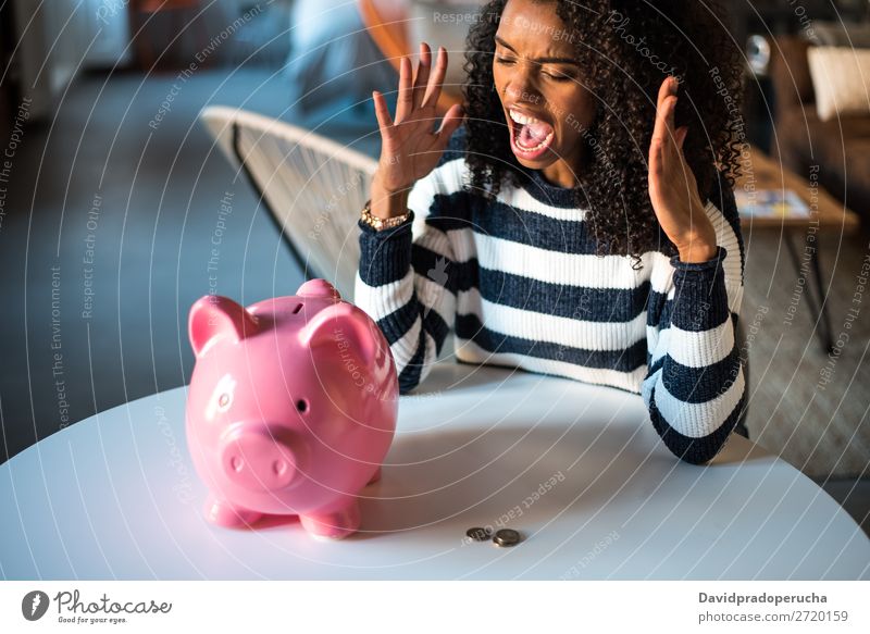 Sad Frustrated Black Woman With Piggy Bank A Royalty Free Stock - black unhappy woman angry at piggy bank woman money box crisis sadness anger