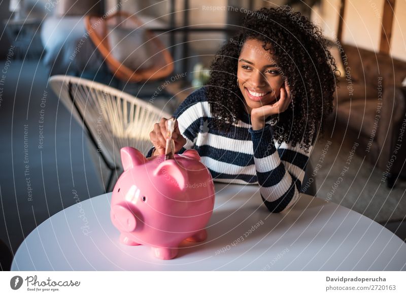 Black woman with saving piggy bank Woman Money box savings Success Business cash Coin pound sterling Beautiful Happy Cheerful investment wealth Budget